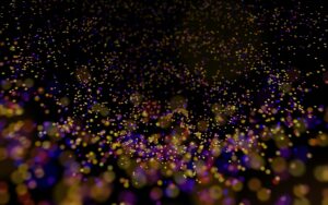A blurry image of a lot of gold glitter