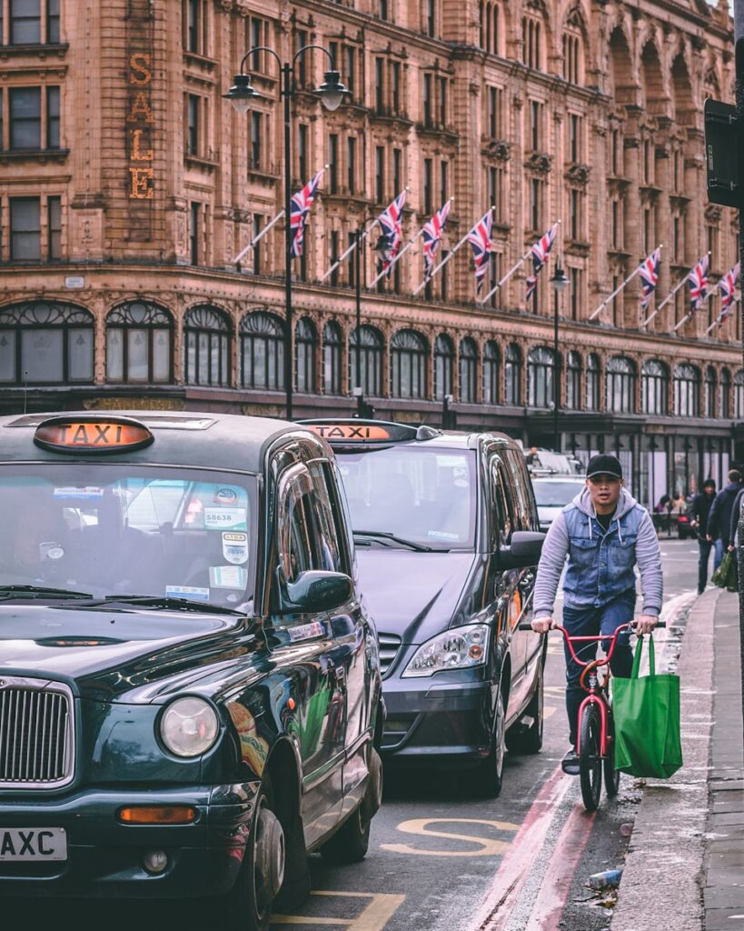 Iconic black taxis, a quintessential part of London's public transportation, known for their convenience and reliability.